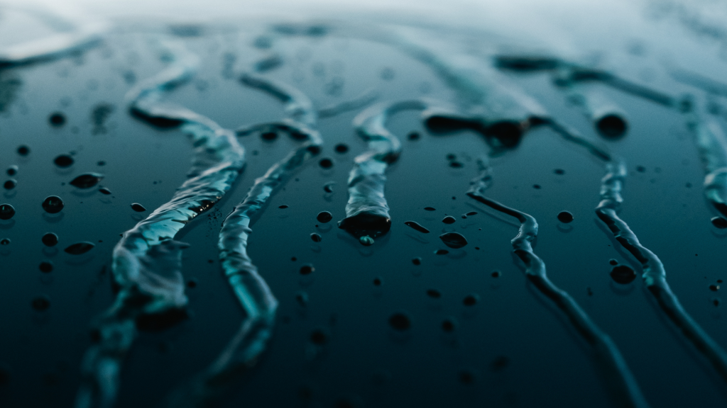 water drops down the windscreen
